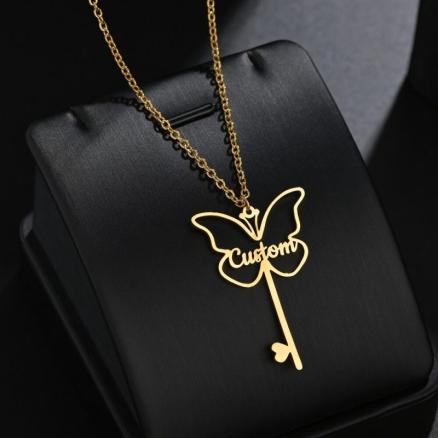 Butterfly and Key design Pendant Product Image